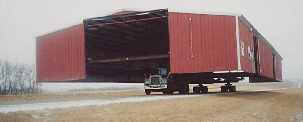 Large shed being moved